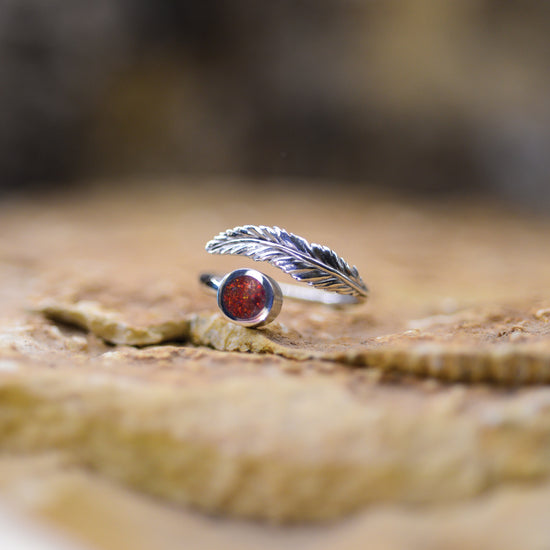 Opals & Ashes Angel Feather Ring Cast in Sterling Silver. Filled with Ruby Red Opals blended with ashes.