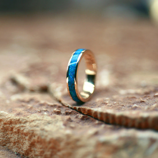 Opals & Ashes Circle Ring Cast in 9ct Yellow Gold. Filled with Pacific Blue Opals blended with ashes.