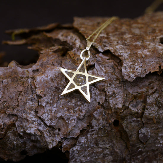 Opals & Ashes five-star memorial Pendant. Yellow gold filled with gold flakes blended with our customers loved one’s ashes
