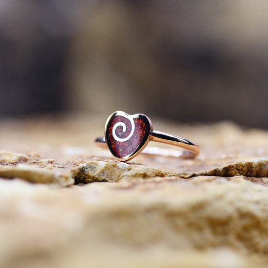 Opals & Ashes Spiral Heart Memorial Ring. Rose Gold & Ruby Red opals blended with our customers loved one’s ashes. 