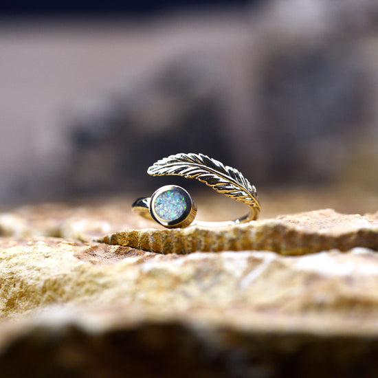 Opals & Ashes Angel Feather Memorial Ring Cast in 9ct Yellow Gold. Filled with Pearl White Opals blended with ashes.